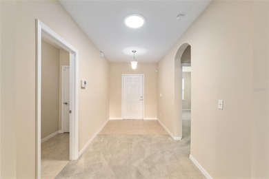 CHAMPIONSHIP GOLF COURSE VIEWS! Welcome to Leesburg's Premier on Arlington Ridge Golf Club in Florida - for sale on GolfHomes.com, golf home, golf lot