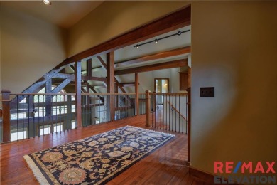 This custom-built timber-frame style home offers 4,514 sq. ft on Olive Glenn Golf and Country Club in Wyoming - for sale on GolfHomes.com, golf home, golf lot