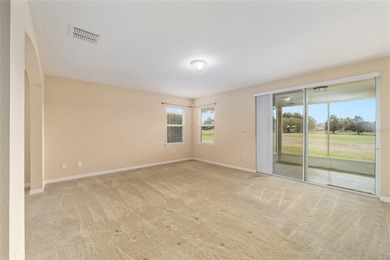 CHAMPIONSHIP GOLF COURSE VIEWS! Welcome to Leesburg's Premier on Arlington Ridge Golf Club in Florida - for sale on GolfHomes.com, golf home, golf lot