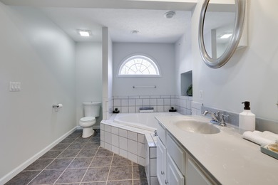 Experience resort-style living in this stunning 5-bedroom on Pocono Farms Country Club in Pennsylvania - for sale on GolfHomes.com, golf home, golf lot