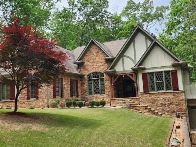 Once in a while, a home comes along that is truly in a class of on The Highlands Course at Lake Arrowhead in Georgia - for sale on GolfHomes.com, golf home, golf lot