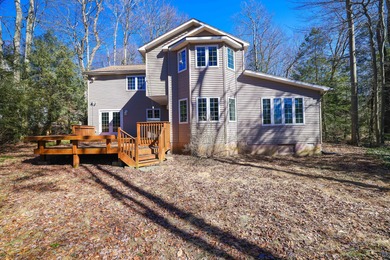 Experience resort-style living in this stunning 5-bedroom on Pocono Farms Country Club in Pennsylvania - for sale on GolfHomes.com, golf home, golf lot