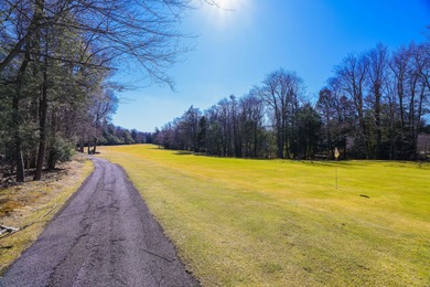 Experience resort-style living in this stunning 5-bedroom on Pocono Farms Country Club in Pennsylvania - for sale on GolfHomes.com, golf home, golf lot