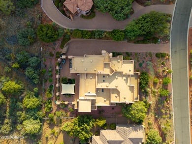 Perched on the side of a mountain and backing directly to on Sedona Golf Resort in Arizona - for sale on GolfHomes.com, golf home, golf lot