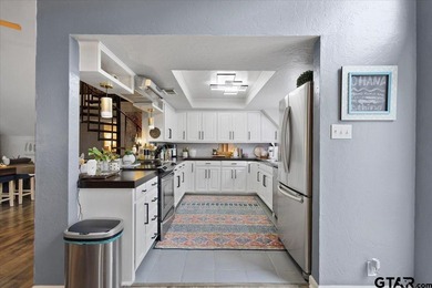 Welcome to this wonderful 3 bedroom, 2.5 bath home located on on Hide-A-Way Lake Golf Course in Texas - for sale on GolfHomes.com, golf home, golf lot