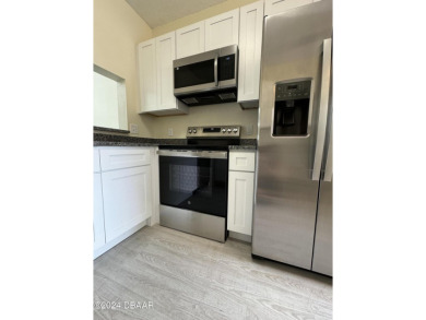 This COMPLETELY RENOVATE two-bedroom and two-bath condominium on Ventura Country Club in Florida - for sale on GolfHomes.com, golf home, golf lot