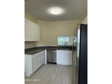 This COMPLETELY RENOVATE two-bedroom and two-bath condominium on Ventura Country Club in Florida - for sale on GolfHomes.com, golf home, golf lot