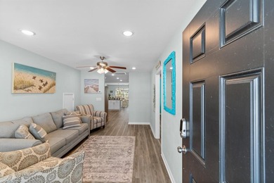 Welcome home to this beautifully maintained 5-bedroom, 3 full on Heron Point Golf Club in South Carolina - for sale on GolfHomes.com, golf home, golf lot