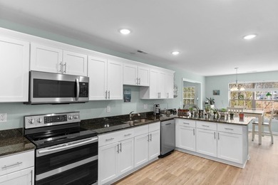 Welcome home to this beautifully maintained 5-bedroom, 3 full on Heron Point Golf Club in South Carolina - for sale on GolfHomes.com, golf home, golf lot