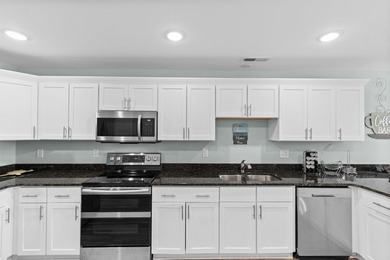 Welcome home to this beautifully maintained 5-bedroom, 3 full on Heron Point Golf Club in South Carolina - for sale on GolfHomes.com, golf home, golf lot