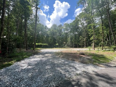 Beautiful flat building lot on the golf course of Wade Hampton on Wade Hampton Golf Club in North Carolina - for sale on GolfHomes.com, golf home, golf lot