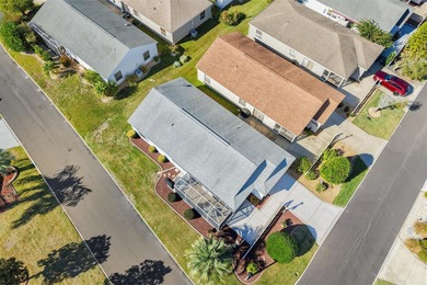 BARELY LIVED IN 2/2 *Colony* Patio Villa TURNKEY in the VILLAGE on Truman Executive Golf Course in Florida - for sale on GolfHomes.com, golf home, golf lot