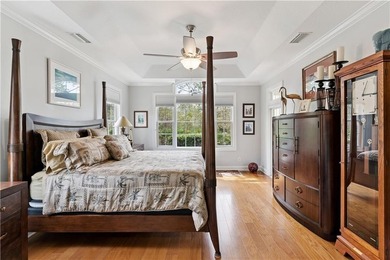 Beautiful custom-designed coastal retreat located in the highly on The Golf Club At Sanctuary Cove in Georgia - for sale on GolfHomes.com, golf home, golf lot