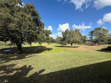 HURRY! This lovely one-of-a-kind, move-in ready GOLF course view on Kings Ridge Golf Club in Florida - for sale on GolfHomes.com, golf home, golf lot