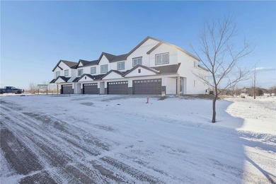 Welcome home to this stunning end-unit townhome built by local on Territory Golf Club in Minnesota - for sale on GolfHomes.com, golf home, golf lot