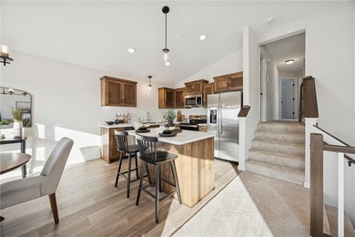 Welcome home to this stunning end-unit townhome built by local on Territory Golf Club in Minnesota - for sale on GolfHomes.com, golf home, golf lot