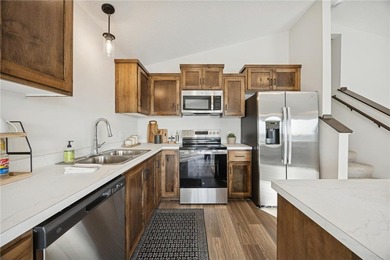 Welcome home to this stunning end-unit townhome built by local on Territory Golf Club in Minnesota - for sale on GolfHomes.com, golf home, golf lot