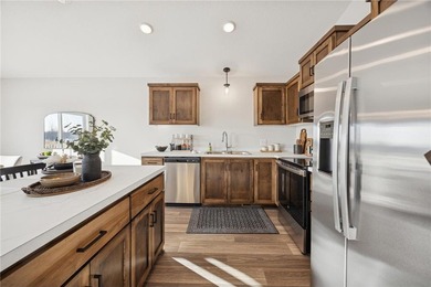 Welcome home to this stunning end-unit townhome built by local on Territory Golf Club in Minnesota - for sale on GolfHomes.com, golf home, golf lot