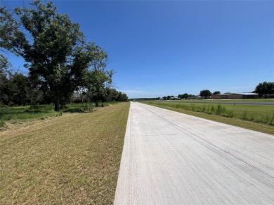 PILOTS! FLY IN to view this stunning 1.28-acre homesite with on Pecan Plantation Country Club in Texas - for sale on GolfHomes.com, golf home, golf lot
