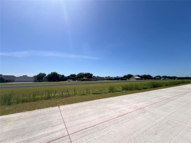 PILOTS! FLY IN to view this stunning 1.28-acre homesite with on Pecan Plantation Country Club in Texas - for sale on GolfHomes.com, golf home, golf lot