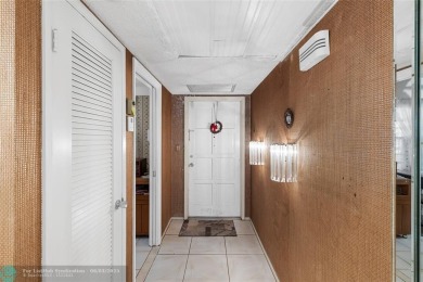 Discover the potential in this ground-floor 2-bedroom 2 bath on Palm-Aire Country Club and Resort - Palms in Florida - for sale on GolfHomes.com, golf home, golf lot