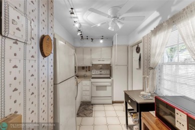 Discover the potential in this ground-floor 2-bedroom 2 bath on Palm-Aire Country Club and Resort - Palms in Florida - for sale on GolfHomes.com, golf home, golf lot
