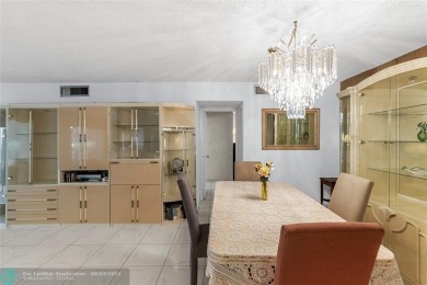 Discover the potential in this ground-floor 2-bedroom 2 bath on Palm-Aire Country Club and Resort - Palms in Florida - for sale on GolfHomes.com, golf home, golf lot