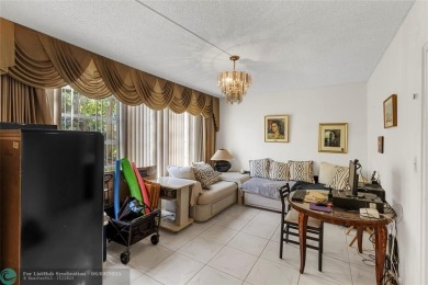 Discover the potential in this ground-floor 2-bedroom 2 bath on Palm-Aire Country Club and Resort - Palms in Florida - for sale on GolfHomes.com, golf home, golf lot