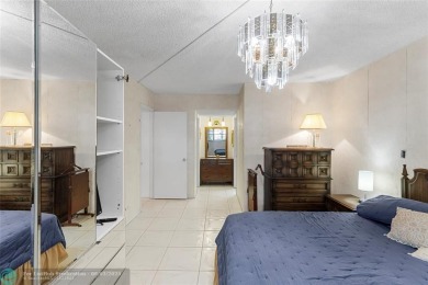 Discover the potential in this ground-floor 2-bedroom 2 bath on Palm-Aire Country Club and Resort - Palms in Florida - for sale on GolfHomes.com, golf home, golf lot