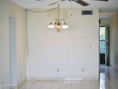 This charming 2-bedroom, 2-bathroom apartment offers a fantastic on Daytona Beach Golf Club in Florida - for sale on GolfHomes.com, golf home, golf lot