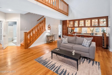 Nestled in a quiet cul-de-sac and backed by a serene pond shaded on Members Club At St. James Plantation in North Carolina - for sale on GolfHomes.com, golf home, golf lot