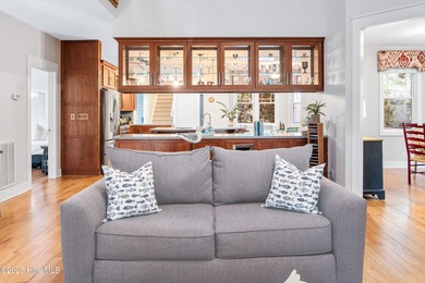 Nestled in a quiet cul-de-sac and backed by a serene pond shaded on Members Club At St. James Plantation in North Carolina - for sale on GolfHomes.com, golf home, golf lot