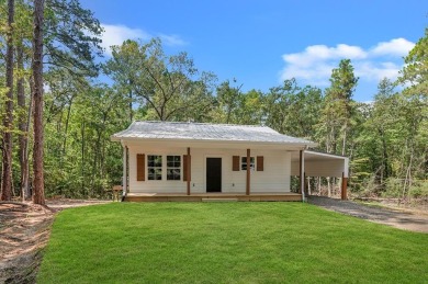 Nestled in the heart of Rayburn Country, this new construction on Rayburn Country Club in Texas - for sale on GolfHomes.com, golf home, golf lot