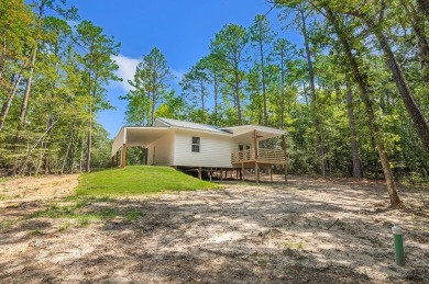 Nestled in the heart of Rayburn Country, this new construction on Rayburn Country Club in Texas - for sale on GolfHomes.com, golf home, golf lot