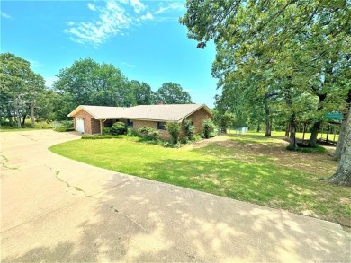 WATERFRONT ON 3 LOTS ON LAKE EUFAULA WITH A TWO STALL ENCLOSED on Arrowhead State Park Golf Course in Oklahoma - for sale on GolfHomes.com, golf home, golf lot