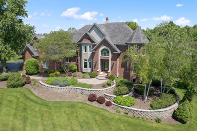 Discover a stunning estate that combines luxury and comfort on Royal Hawk Country Club in Illinois - for sale on GolfHomes.com, golf home, golf lot