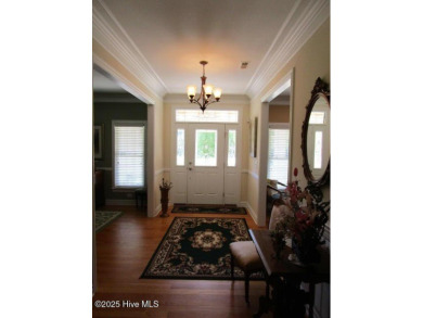 Beautiful Home and yard for Sale in Albemarle Plantation, a on Sound Golf Links at Albemarle Plantation in North Carolina - for sale on GolfHomes.com, golf home, golf lot