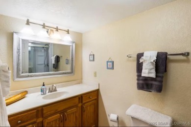 Welcome home to this beautiful 3 bedroom, 3 bathroom retreat on on The Oaks Golf Course in Missouri - for sale on GolfHomes.com, golf home, golf lot