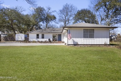 MOVE IN READY and a coveted Diamondhead Location! Near the on Diamondhead Country Club in Mississippi - for sale on GolfHomes.com, golf home, golf lot