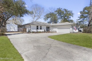 MOVE IN READY and a coveted Diamondhead Location! Near the on Diamondhead Country Club in Mississippi - for sale on GolfHomes.com, golf home, golf lot