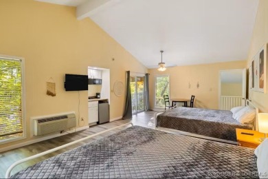Welcome home to this beautiful 3 bedroom, 3 bathroom retreat on on The Oaks Golf Course in Missouri - for sale on GolfHomes.com, golf home, golf lot