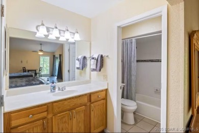 Welcome home to this beautiful 3 bedroom, 3 bathroom retreat on on The Oaks Golf Course in Missouri - for sale on GolfHomes.com, golf home, golf lot
