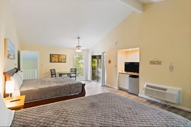 Welcome home to this beautiful 3 bedroom, 3 bathroom retreat on on The Oaks Golf Course in Missouri - for sale on GolfHomes.com, golf home, golf lot