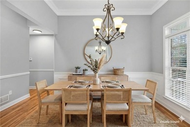 Tucked inside the gated, resort-style community of Fairfield on Fairfield Plantation Golf and Country Club in Georgia - for sale on GolfHomes.com, golf home, golf lot