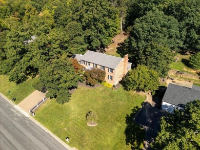 Welcome to this beautifully updated 4 bedroom, 2.1 bath colonial on Hidden Valley Country Club in Virginia - for sale on GolfHomes.com, golf home, golf lot