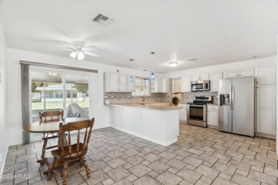 Discover this fully renovated & modernized twin home! This on PalmBrook Country Club in Arizona - for sale on GolfHomes.com, golf home, golf lot