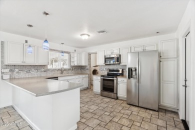 Discover this fully renovated & modernized twin home! This on PalmBrook Country Club in Arizona - for sale on GolfHomes.com, golf home, golf lot