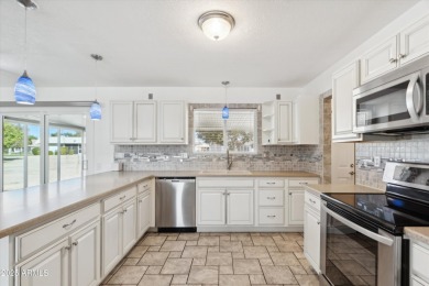 Discover this fully renovated & modernized twin home! This on PalmBrook Country Club in Arizona - for sale on GolfHomes.com, golf home, golf lot