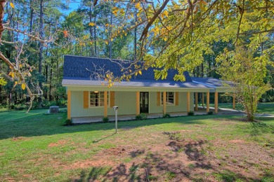 This 2 story beauty backs up to the national forest and is a 3 on Pendleton Harbor in Texas - for sale on GolfHomes.com, golf home, golf lot