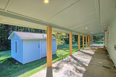 This 2 story beauty backs up to the national forest and is a 3 on Pendleton Harbor in Texas - for sale on GolfHomes.com, golf home, golf lot